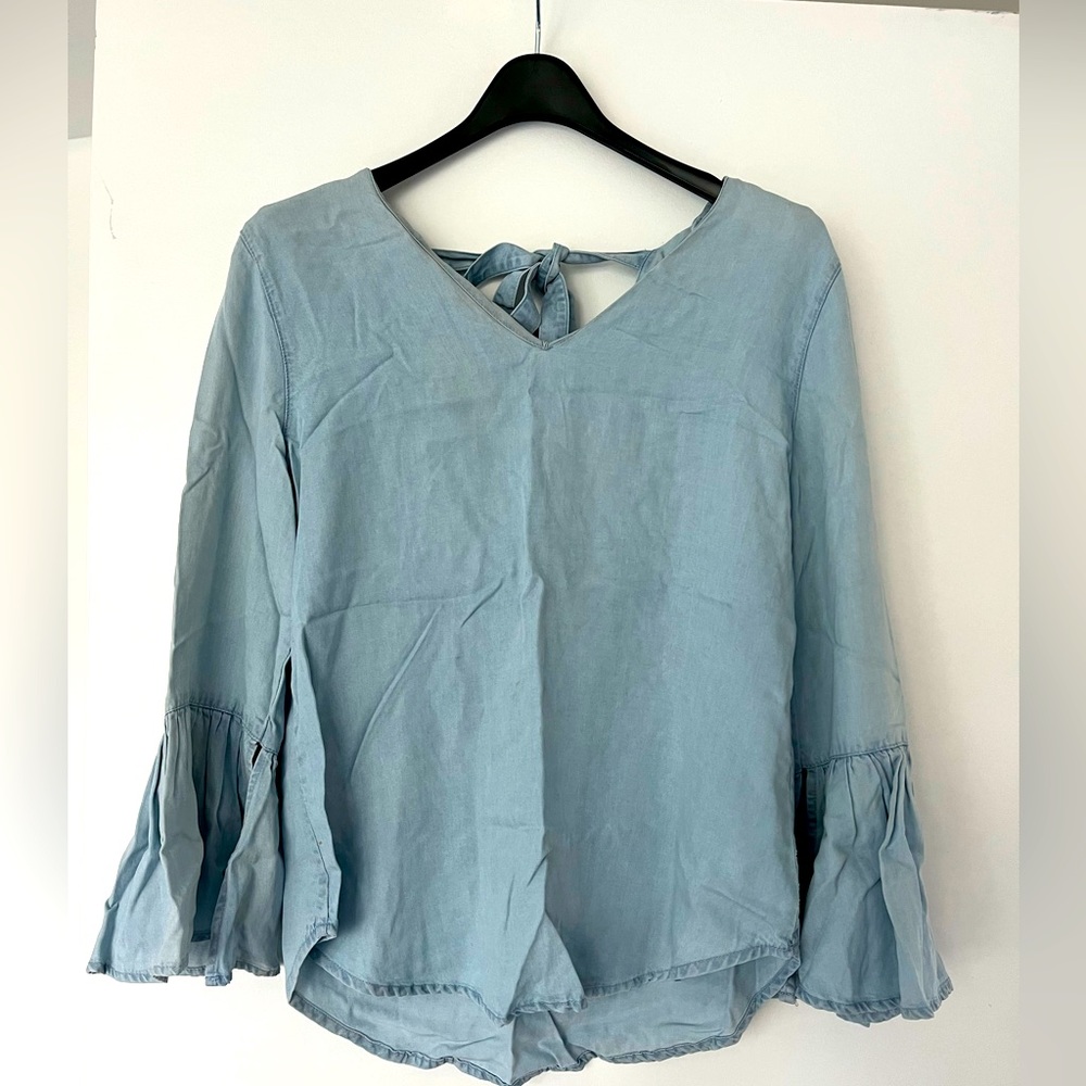 Light denim-ish top with bell sleeves
